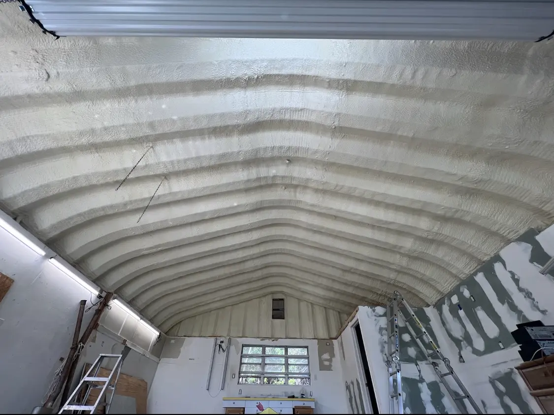 Spray polyurethane foam applied to the underside of a metal roof deck in Chesapeake Ranch Estates